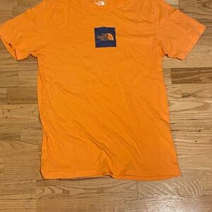 The North Face Men’s Bright Orange Tee with Navy Chest Logo
